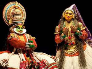 Kathakali performer in traditional costume and face paint