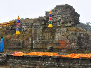 Ancient stone ruins of the Mangala Devi temple in the forest